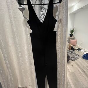 Sleek Black Sleeveless Jumpsuit with V-Neck Design